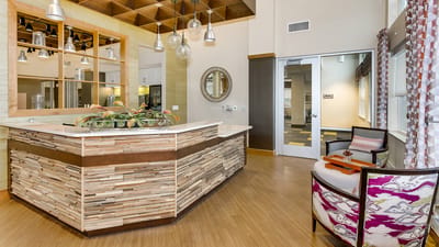Bright interior common area with a reception desk
