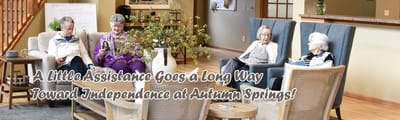 Residents enjoying a common area with comfortable seating