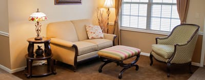 Cozy sitting area with sofa and lamp