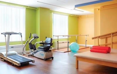 Interior view of a therapy room with equipment