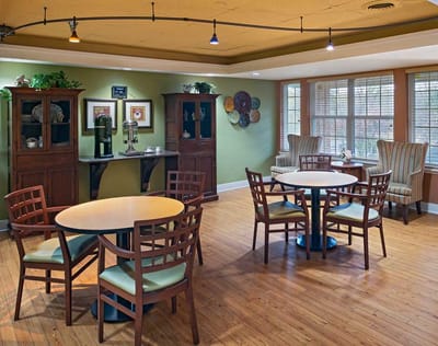 Cozy common area with tables and chairs