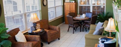 Bright and inviting common area with seating and decor