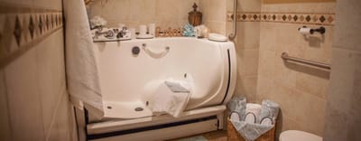 A brightly lit bathroom with safety features