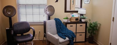 Hair salon interior with equipment and seating