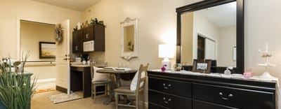 Cozy interior of a resident's room with furniture and decor