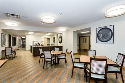 Bright dining area with tables and chairs