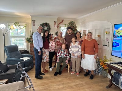 Residents and family celebrating together in a common area