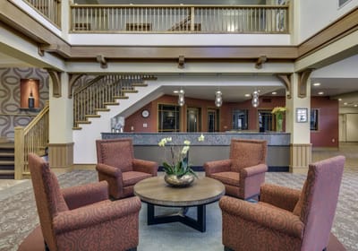 Welcoming interior lobby with seating and plants