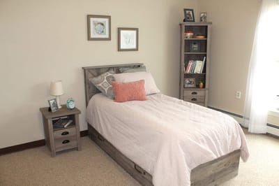 Cozy bedroom setup in a senior living facility