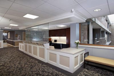A well-lit common area of the facility lobby