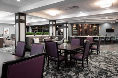 Bright and modern common area with seating and decor