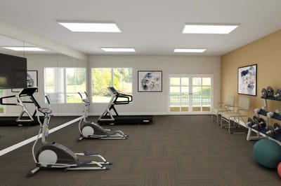 Well-equipped fitness room with exercise machines