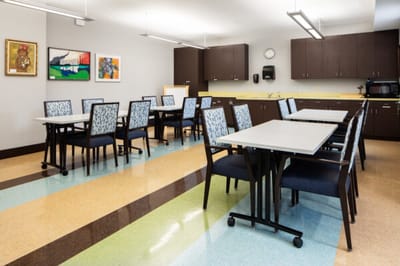 Bright dining room with tables and chairs