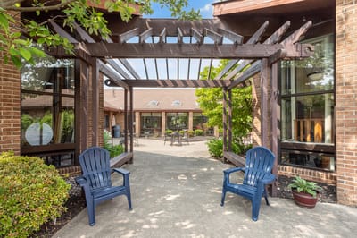 Outdoor seating area with garden view