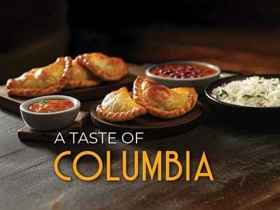 Traditional Colombian food displayed on wooden platters