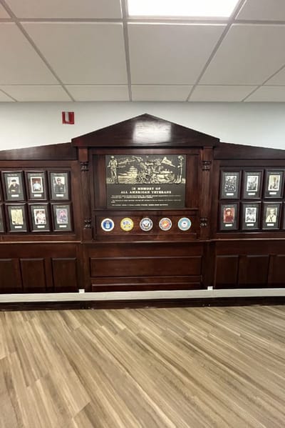 Display commemorating residents and veterans with framed images