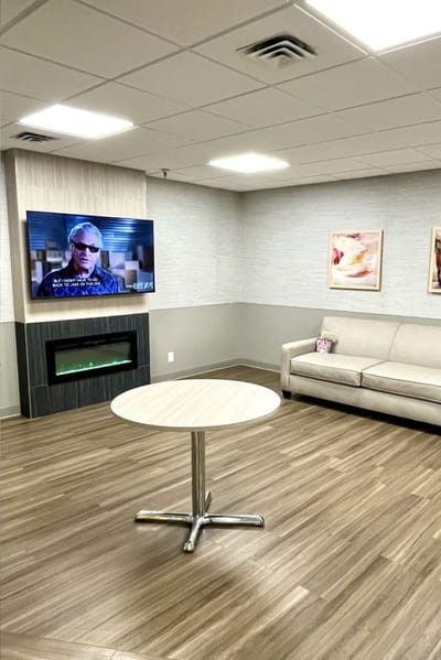 Cozy common area with a TV and seating