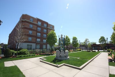 Exterior view of Churchview Supportive Living with landscaped area