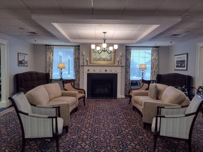 Cozy common area with comfortable seating and fireplace