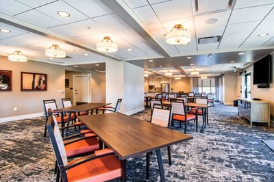 Interior dining area with tables and chairs
