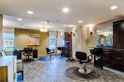 Stylish salon area with salon chairs and mirrors
