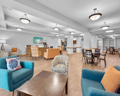 Bright common area with seating and decor