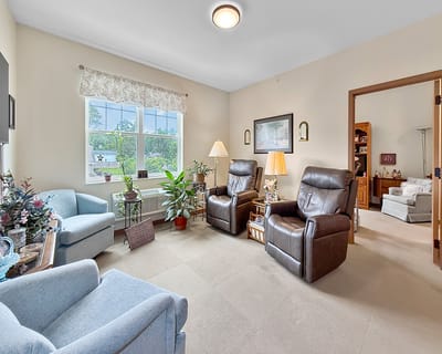 Cozy interior lounge with comfortable seating and plants