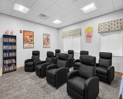 Comfortable movie room with recliner seats