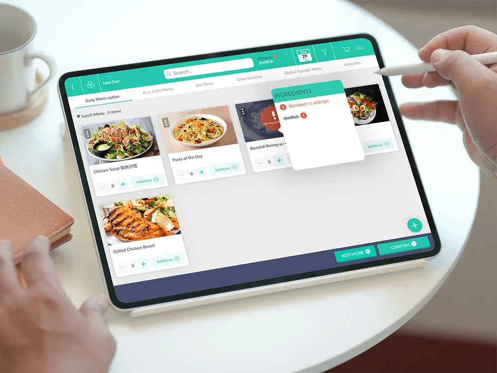 A digital menu on a tablet showcasing meal options