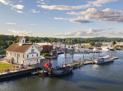 A scenic view of a waterfront facility and marina