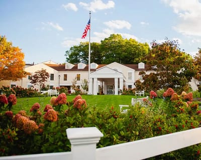 Exterior view of Essex Meadows facility with gardens