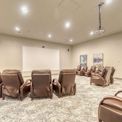Interior theater room with reclining chairs