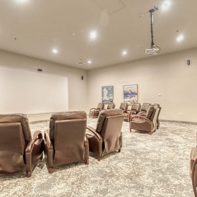Cozy theater room with reclining chairs