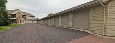 Exterior view of a residential building and garage