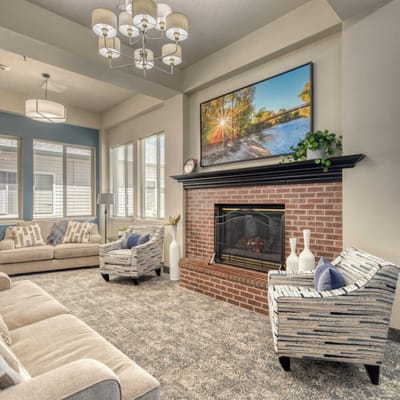 Cozy common area with seating and a fireplace