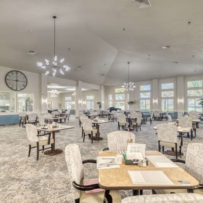 Interior view of the dining room with tables and chairs