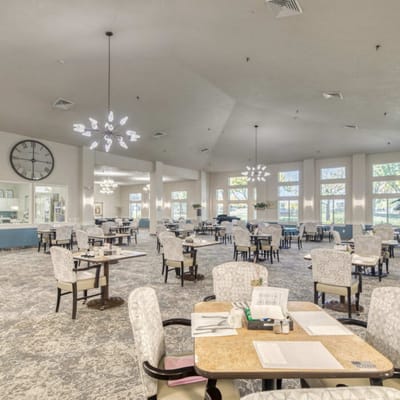 Dining area with neatly arranged tables and modern decor