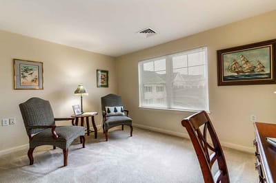 Cozy interior corner of a resident room with chairs