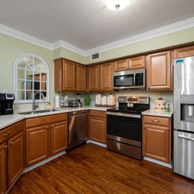 Modern kitchen with appliances and wooden cabinets