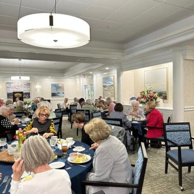 Residents enjoying a meal in the dining room
