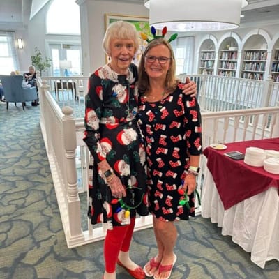 Residents celebrating with festive attire in a common area