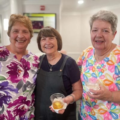 Residents and staff celebrating together in a common area