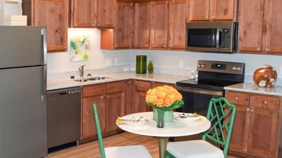 Bright kitchen area with modern appliances and decor