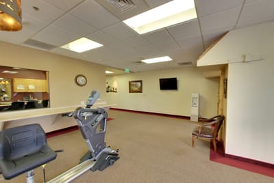 Interior view of a fitness area with exercise equipment