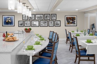 Dining area with tables set and food displayed