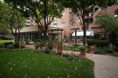 Garden area with seating and plants around the facility