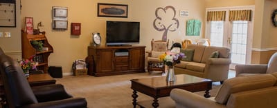 Interior view of a cozy common area with seating