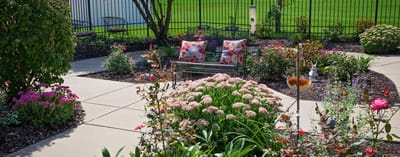 Well-maintained garden area with colorful flowers