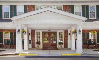 Exterior view of the Brighton Gardens entrance with porch