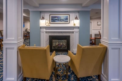 Cozy common area with seating and fireplace